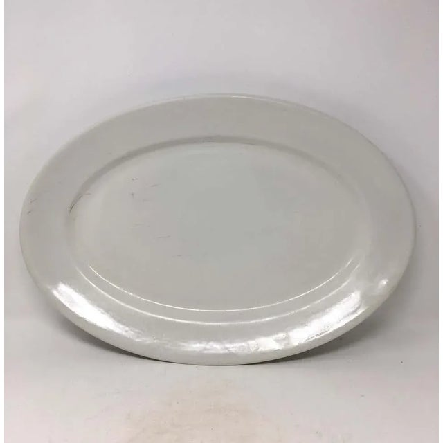 This large ironstone platter is lovely and versatile. It could be used as a serving piece or as a centerpiece filled with...