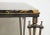 Bespoke coffee table designed in the style of Gilbert Poillerat, base of bronze and iron with gold and black marble top.