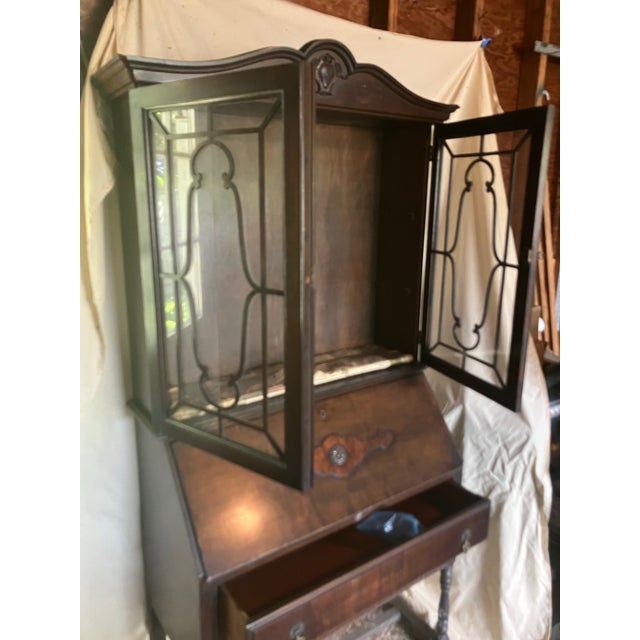 Antique Secretary Desk. Early 1900’s. Antique key included to open cabinet doors & desk. 2 custom glass shelves included.