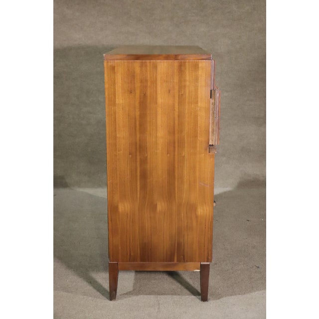 Tall vintage dresser with five wide drawers, sculpted front, burl veneer.