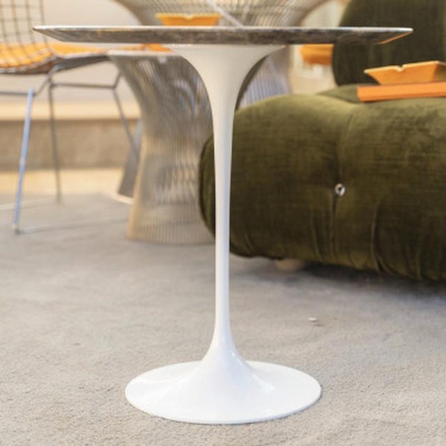 Eero Saarinen (1910-1961) & Knoll International Side table with a round Emperador marble top on a tulip base. Dimensions:...
