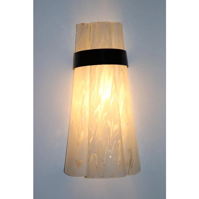 Murano Rare Wall Glass Lamp, Transparent "Variegato" White. Mounting: White lacquered metal with black accent. The...
