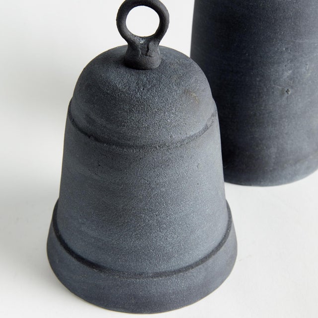 Finished in an aged zinc tone, these old fashioned cast aluminum historic shapes are actual functioning bells. Place atop...