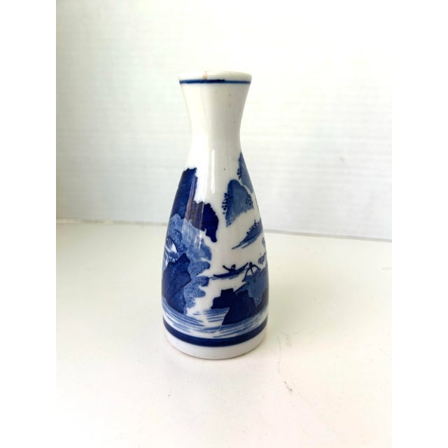 1970's Vintage Blue and White Asian Bud Vase 5.10"H X 1.25"D Top X Base 2.25"D in very good condition.