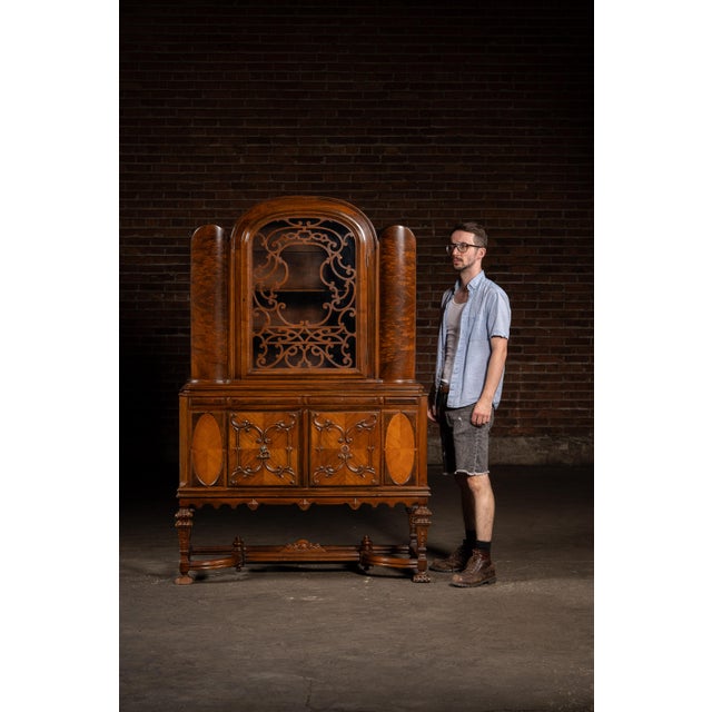 c. 1920s-1930s; (likely) Berkey & Gay Furniture Co. - Grand Rapids, MI Tall display cabinet crafted in rich mahogany and...