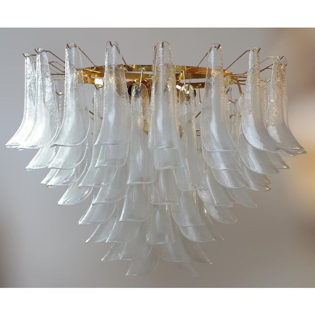 Italian chandelier shown with clear and light milky white Murano glass petals mounted on 24 k gold finish frame / Designed...