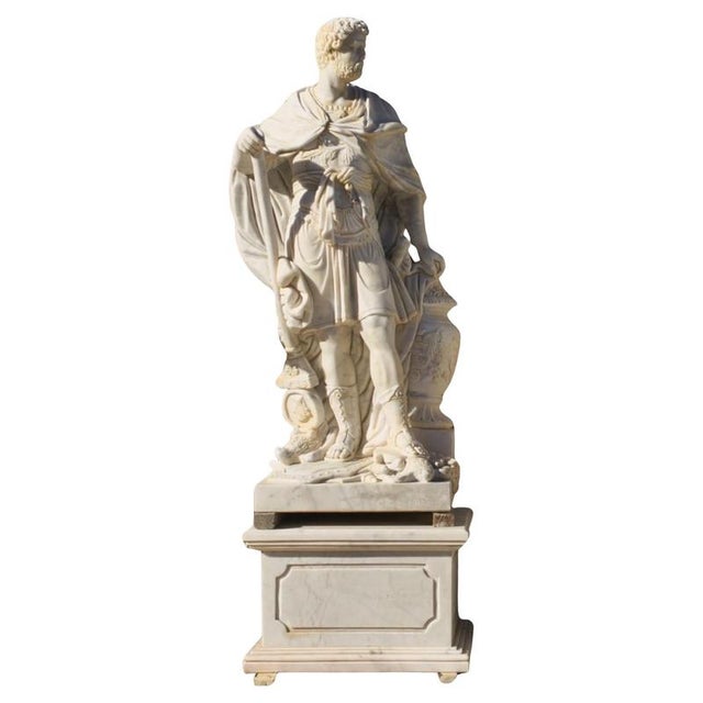 A magnificent pair of superior solid Carrara marble figures, crafted with remarkable precision and artistry. Standing at...