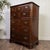 Vintage Drexel Heritage tall chest of drawers from the Chippendale collection, crafted in flame mahogany veneer and...