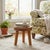 A beautifully worn pine milking stool, crafted in the traditional three-leg form used across rural Europe and early...
