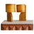 One available. A French table lamp from the 1960s, its sculpted wooden base rising in an angular profile to support a...