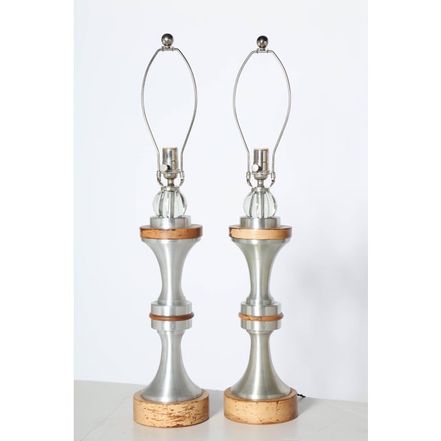 Pair of Mid Century Russel Wright Style stacked Spun Aluminum, Maple and Crystal Table Lamps. Featuring a machined spun...
