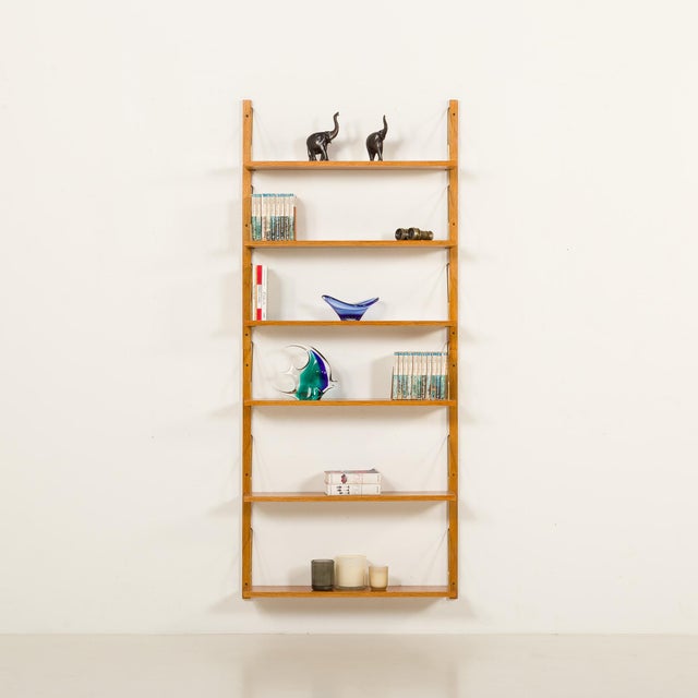 Mid-Century Scandinavian Shelving Unit in Golden Oak, 1960s, in Flawless conditions. Designed 1960 to 1969