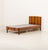 This Danish Pau Ferro rosewood bed frame was made in the 1960s. Crafted from solid Pau Ferro and Pau Ferro veneer, it...