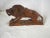 Angular lion statuette in walnut, popular creation but style very inspired by art deco. This statuette is at the same time...