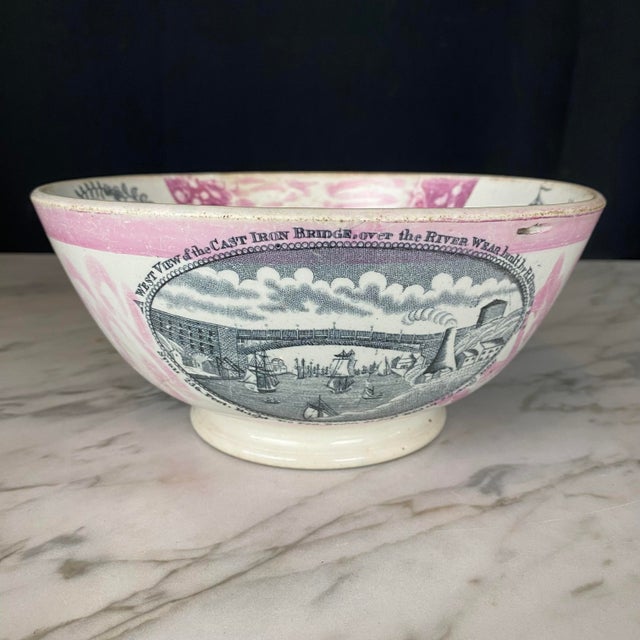 Charming 19th-century English Sunderland pink lustreware punch bowl, richly decorated with transfer-printed maritime...
