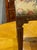 This 19th century French Louis XVI carved oak stool is a luxurious and elegant piece of furniture perfect for adding a...