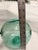 This large aqua glass fishing float is a unique decorative piece with a charming antique look. Measuring approximately 9...