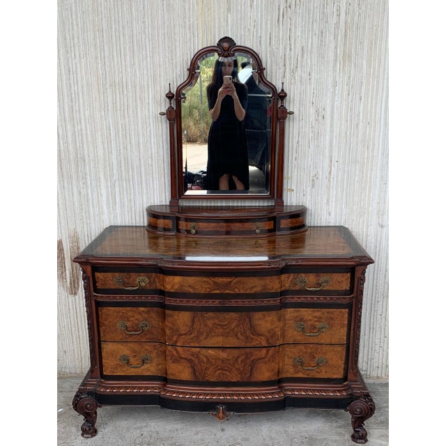 About A elegant serpentine Venetian 1900s Baroque commode chest of drawers in ebonized hand carved walnut and walnut...
