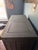 Painted a charcoal/gray finish with an aged/distressed look. The ornate detailing along the bottom and trim gives it a...