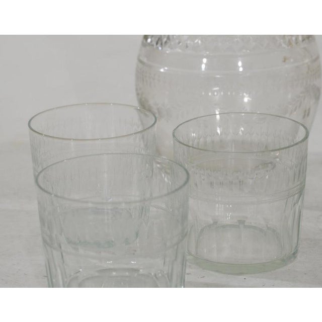 Swedish set of glass, with two carafes and six glasses, circa 1880 glass: h. 7 dia. 7 cm h. 2.7 dia. 2.7 in jug: h. 19...