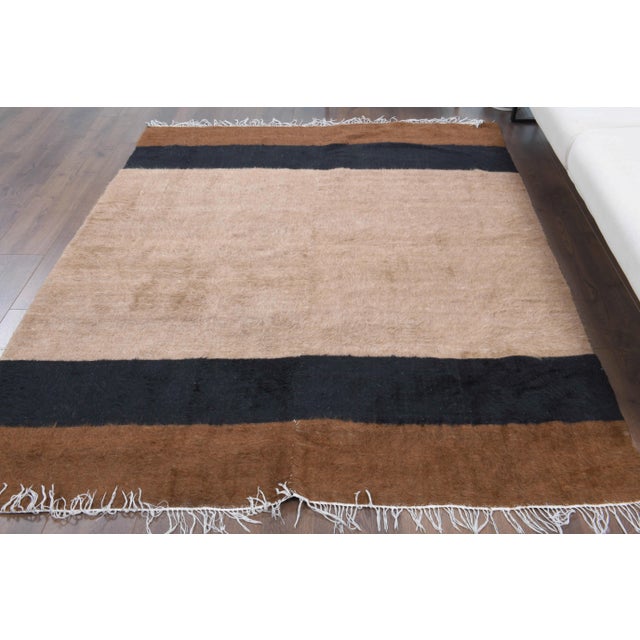 Vintage Turkish Hand-Knotted vintage rug is a semi-antique vintage kilim rug.'70s Eastern region of Turkey's unique rug is...