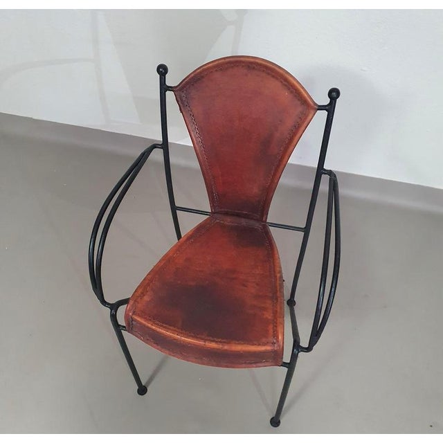 24 chairs in leather and solid wrought iron / very heavy