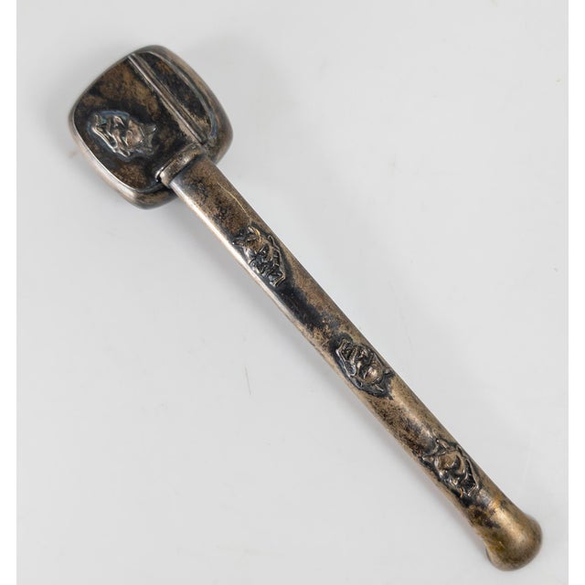 We are selling this nice Japanese Silver Yatate. This yatate has traditional form and is decorated with applied oni masks,...
