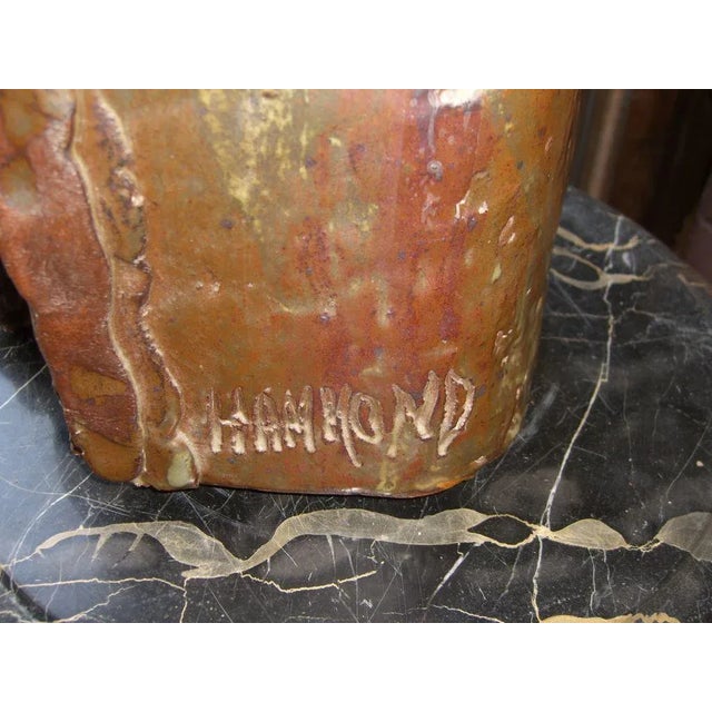 A beautiful large glazed terracotta sculpture by the noted East Hampton based artist Phyllis Hammond. It is quite large...