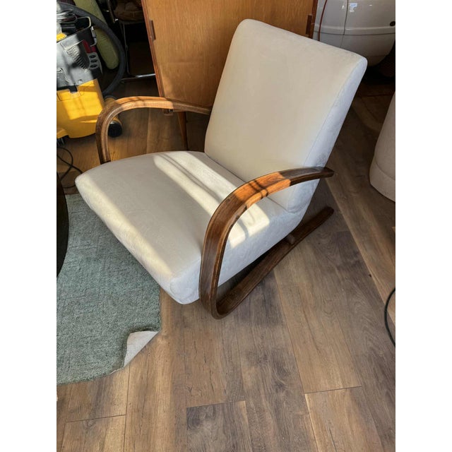 A very elegant armchair designed by Jindrich Halabala in 1930 in the Czech Republic. Model H 269 Newly upholstered in...