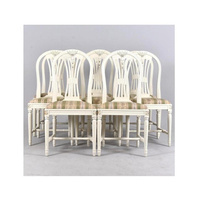 Rare and Unusual early second half of the 20th century set of 8 Gustavian AXet dining chairs in distressed paint finish...