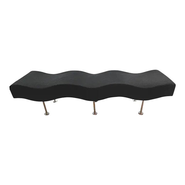 The Undulatus Bench, designed by renowned modernist Stanley Jay Friedman and manufactured by Brueton around 2005, is a...