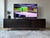 Room & Board Hudson Media Cabinet in excellent condition. Maple wood with charcoal stain finish and a stainless steel...