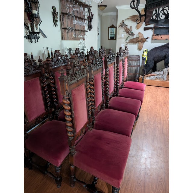 Very unique dining set Came from Belgium Carved walnut with seats covered with red velvet Two armchairs ( 53"h x 25" x...