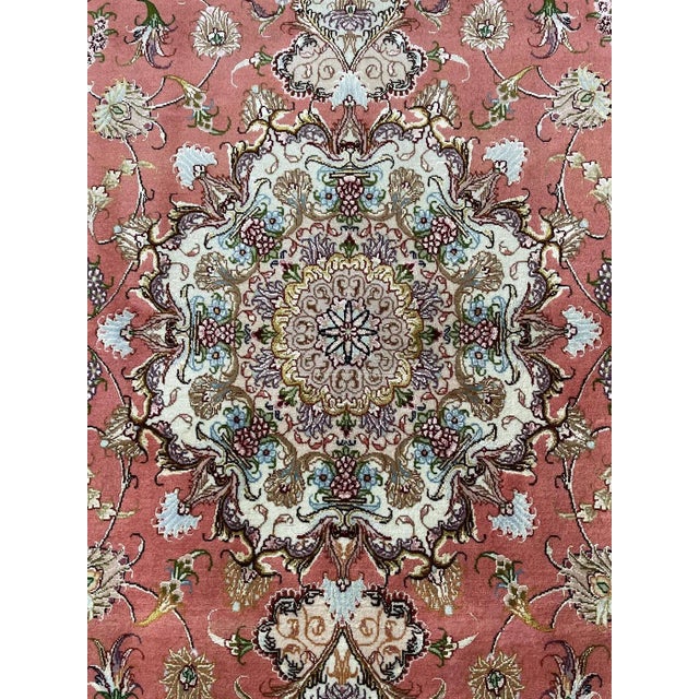A very beautiful Tabriz rug, hand knotted in 1990s with 75% wool and 25% cotton, dyed with pigment from vegetable. This...