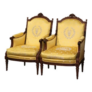 19th Century French Louis XVI Walnut Bergères With Carved Eagle Crest For Sale