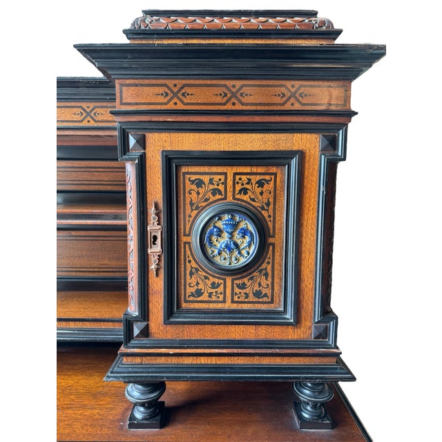 58"H x 59"W x 31"D Knee Hole: 26"H x 27"W A compelling acquisition for the discerning designer and collector, this English...