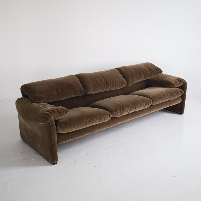 c. 1980s, signed - excellent, restored condition. This piece has been fully reupholstered in chocolate brown mohair