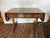 Drop leaf sofa table or desk having richly grained wood, two drawers on one side and two dummy drawers on the other side...