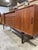 Rare Danish Mid Century Modern teak sideboard by Knud Nielsen for Losning Mobelfabrik.