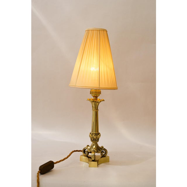 Brass polished and stove enameled The fabric shade is replaced ( new ) European Plug (up to 250V).The wiring of this item...