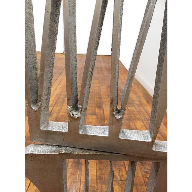Bold bright and graphic two piece sculpture. Mounted on an aluminum base. One side may be considered the front as it has...
