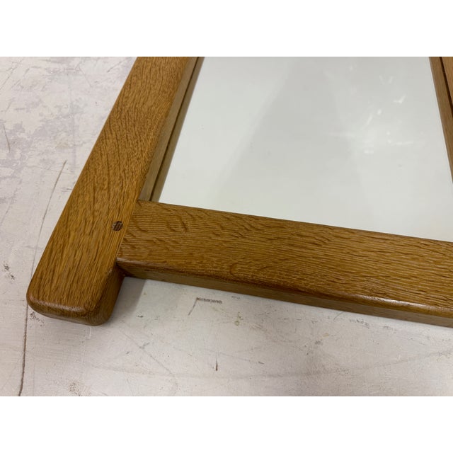 1960s Belgian Oak Brutalist Mirror A solid and sculptural wall mirror in oak, Belgium, circa 1960s. Executed in a...