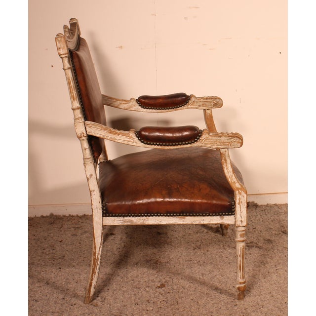 Superb Louis XVI armchair in polychrome wood from the end of the 18th Century Very beautiful armchair covered with brown...
