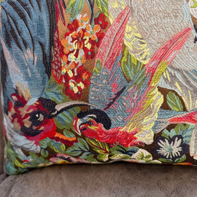 The composition fills the full face of the cover with a dense arrangement of exotic birds and flowering botanicals, no...