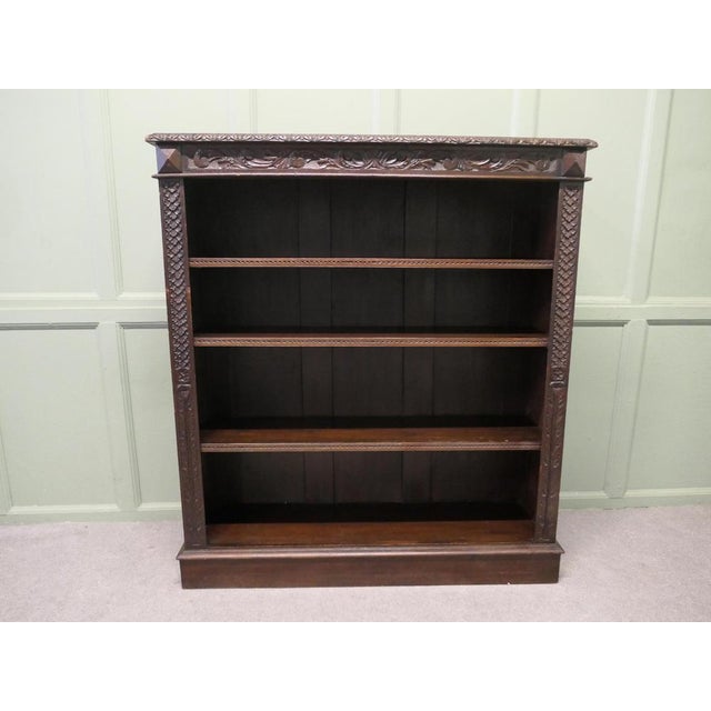 Carved Oak Open Bookcase. The bookcase is good quality, with attractive carving on the front It is in good original...