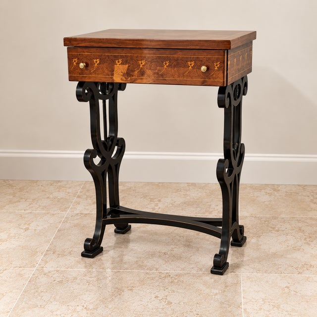 Add distinctive European character to your interior with this elegant French-style side table, featuring a richly finished...