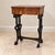 Add distinctive European character to your interior with this elegant French-style side table, featuring a richly finished...