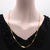 Circa the Victorian era, this French 18k gold chain alternates between a flattened elliptical link and series of small...