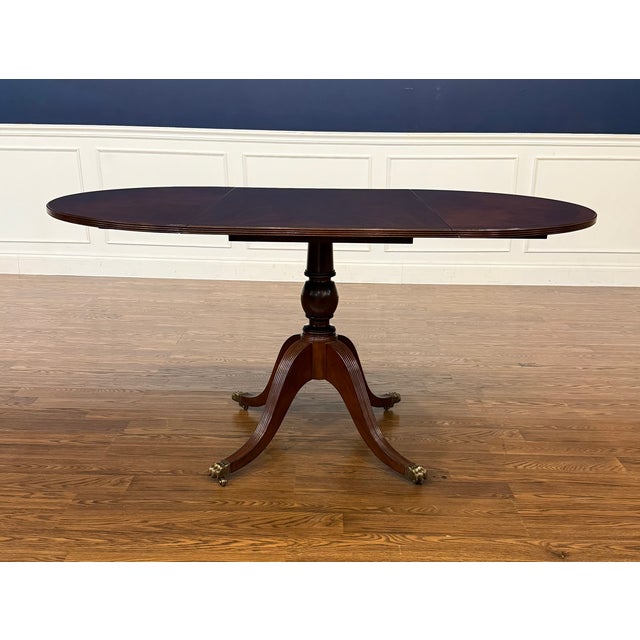 This is a mahogany table with fold down leaves. It can have multiple uses around the home. It is ideal as a small dining...