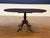 This is a mahogany table with fold down leaves. It can have multiple uses around the home. It is ideal as a small dining...